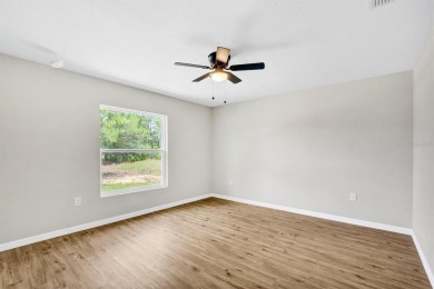 Modern luxury, total privacy, and top-tier amenities--this on Indian Lake Estates Golf and Country Club in Florida - for sale on GolfHomes.com, golf home, golf lot