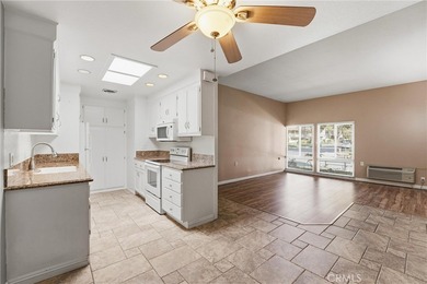 This light-filled Monterey model condo in Laguna Woods offers a on Leisure Village Par 3 Golf Course in California - for sale on GolfHomes.com, golf home, golf lot