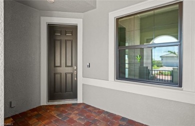 Enjoy low-maintenance, resort-style living in this beautifully on River Hall Country Club in Florida - for sale on GolfHomes.com, golf home, golf lot