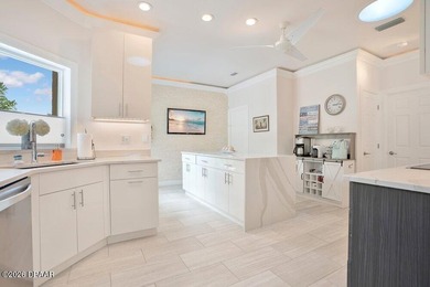 Drenched in natural light and beautifully upgraded throughout on  in Florida - for sale on GolfHomes.com, golf home, golf lot