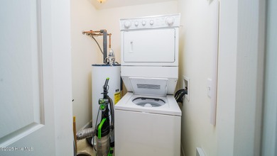 You'll love this 2 bedroom, 2 bath upper condo with a spacious on Brunswick Plantation and Golf Resorts in North Carolina - for sale on GolfHomes.com, golf home, golf lot