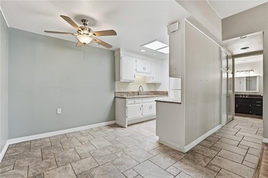 This light-filled Monterey model condo in Laguna Woods offers a on Leisure Village Par 3 Golf Course in California - for sale on GolfHomes.com, golf home, golf lot