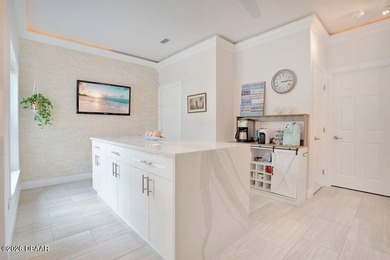 Drenched in natural light and beautifully upgraded throughout on  in Florida - for sale on GolfHomes.com, golf home, golf lot