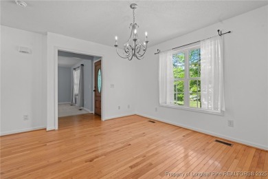 Welcome to Carolina Seasons! This charming 3-bedroom, 2.5-bath on Ponderosa Golf Club in North Carolina - for sale on GolfHomes.com, golf home, golf lot