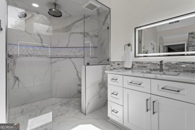 Discover a rare opportunity to own a beautifully updated home in on The Golf Club of Georgia in Georgia - for sale on GolfHomes.com, golf home, golf lot