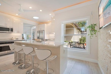 Drenched in natural light and beautifully upgraded throughout on  in Florida - for sale on GolfHomes.com, golf home, golf lot