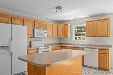 Welcome to Carolina Seasons! This charming 3-bedroom, 2.5-bath on Ponderosa Golf Club in North Carolina - for sale on GolfHomes.com, golf home, golf lot