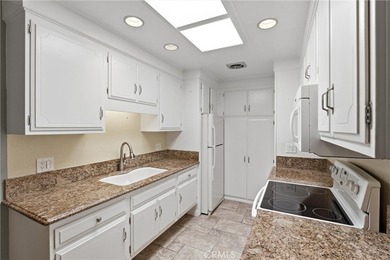 This light-filled Monterey model condo in Laguna Woods offers a on Leisure Village Par 3 Golf Course in California - for sale on GolfHomes.com, golf home, golf lot
