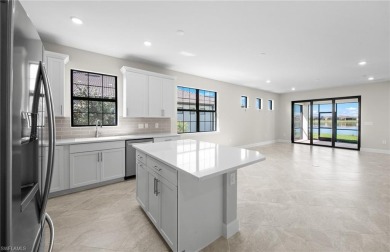 Enjoy low-maintenance, resort-style living in this beautifully on River Hall Country Club in Florida - for sale on GolfHomes.com, golf home, golf lot