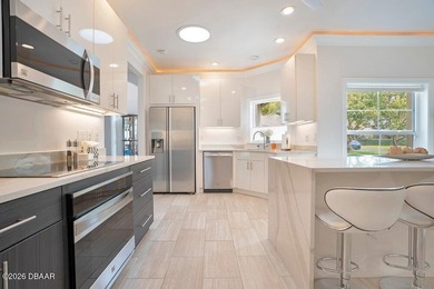 Drenched in natural light and beautifully upgraded throughout on  in Florida - for sale on GolfHomes.com, golf home, golf lot