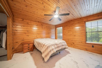 EAST TEXAS DREAM - Fabulous log home with wraparound porches on Southern Hills Golf Club in Texas - for sale on GolfHomes.com, golf home, golf lot