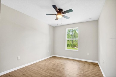 Modern luxury, total privacy, and top-tier amenities--this on Indian Lake Estates Golf and Country Club in Florida - for sale on GolfHomes.com, golf home, golf lot
