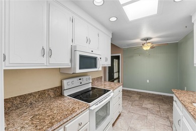 This light-filled Monterey model condo in Laguna Woods offers a on Leisure Village Par 3 Golf Course in California - for sale on GolfHomes.com, golf home, golf lot