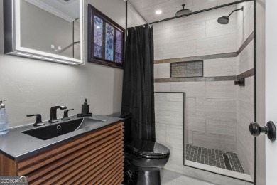 Discover a rare opportunity to own a beautifully updated home in on The Golf Club of Georgia in Georgia - for sale on GolfHomes.com, golf home, golf lot