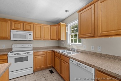 Welcome to Carolina Seasons! This charming 3-bedroom, 2.5-bath on Ponderosa Golf Club in North Carolina - for sale on GolfHomes.com, golf home, golf lot