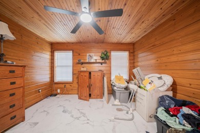 EAST TEXAS DREAM - Fabulous log home with wraparound porches on Southern Hills Golf Club in Texas - for sale on GolfHomes.com, golf home, golf lot