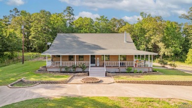 EAST TEXAS DREAM - Fabulous log home with wraparound porches on Southern Hills Golf Club in Texas - for sale on GolfHomes.com, golf home, golf lot