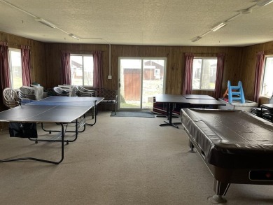 150' shared LAKEFRONT on Houghton Lake! 150' dock with on Pine View Highlands Golf Course in Michigan - for sale on GolfHomes.com, golf home, golf lot