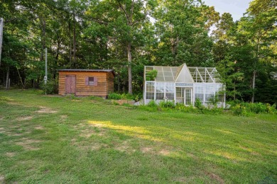 EAST TEXAS DREAM - Fabulous log home with wraparound porches on Southern Hills Golf Club in Texas - for sale on GolfHomes.com, golf home, golf lot