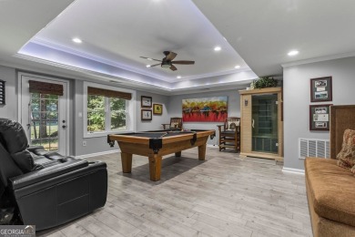 Discover a rare opportunity to own a beautifully updated home in on The Golf Club of Georgia in Georgia - for sale on GolfHomes.com, golf home, golf lot