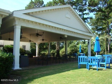 You'll love this 2 bedroom, 2 bath upper condo with a spacious on Brunswick Plantation and Golf Resorts in North Carolina - for sale on GolfHomes.com, golf home, golf lot