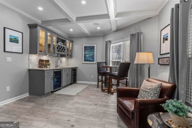 Discover a rare opportunity to own a beautifully updated home in on The Golf Club of Georgia in Georgia - for sale on GolfHomes.com, golf home, golf lot