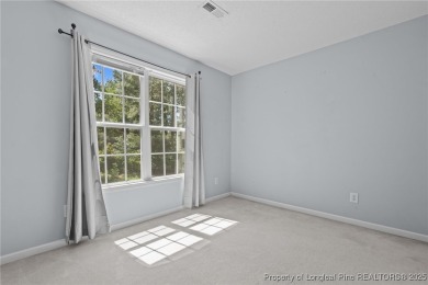Welcome to Carolina Seasons! This charming 3-bedroom, 2.5-bath on Ponderosa Golf Club in North Carolina - for sale on GolfHomes.com, golf home, golf lot