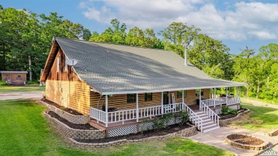 EAST TEXAS DREAM - Fabulous log home with wraparound porches on Southern Hills Golf Club in Texas - for sale on GolfHomes.com, golf home, golf lot