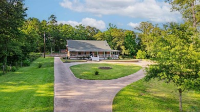 EAST TEXAS DREAM - Fabulous log home with wraparound porches on Southern Hills Golf Club in Texas - for sale on GolfHomes.com, golf home, golf lot