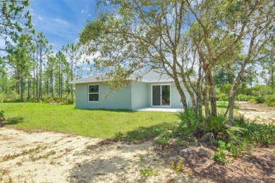 Modern luxury, total privacy, and top-tier amenities--this on Indian Lake Estates Golf and Country Club in Florida - for sale on GolfHomes.com, golf home, golf lot