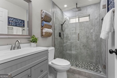 Discover a rare opportunity to own a beautifully updated home in on The Golf Club of Georgia in Georgia - for sale on GolfHomes.com, golf home, golf lot