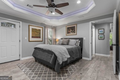 Discover a rare opportunity to own a beautifully updated home in on The Golf Club of Georgia in Georgia - for sale on GolfHomes.com, golf home, golf lot