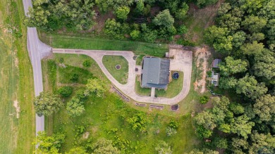 EAST TEXAS DREAM - Fabulous log home with wraparound porches on Southern Hills Golf Club in Texas - for sale on GolfHomes.com, golf home, golf lot