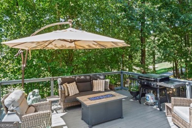 Discover a rare opportunity to own a beautifully updated home in on The Golf Club of Georgia in Georgia - for sale on GolfHomes.com, golf home, golf lot