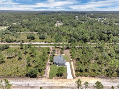 Modern luxury, total privacy, and top-tier amenities--this on Indian Lake Estates Golf and Country Club in Florida - for sale on GolfHomes.com, golf home, golf lot