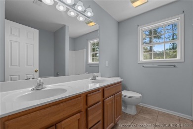 Welcome to Carolina Seasons! This charming 3-bedroom, 2.5-bath on Ponderosa Golf Club in North Carolina - for sale on GolfHomes.com, golf home, golf lot