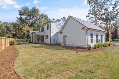 Distinctly Southern details and warm materials blend seamlessly on Frederica Golf Club in Georgia - for sale on GolfHomes.com, golf home, golf lot