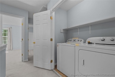 Welcome to Carolina Seasons! This charming 3-bedroom, 2.5-bath on Ponderosa Golf Club in North Carolina - for sale on GolfHomes.com, golf home, golf lot