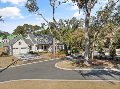 Distinctly Southern details and warm materials blend seamlessly on Frederica Golf Club in Georgia - for sale on GolfHomes.com, golf home, golf lot