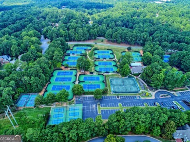 Discover a rare opportunity to own a beautifully updated home in on The Golf Club of Georgia in Georgia - for sale on GolfHomes.com, golf home, golf lot