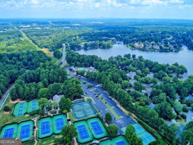 Discover a rare opportunity to own a beautifully updated home in on The Golf Club of Georgia in Georgia - for sale on GolfHomes.com, golf home, golf lot