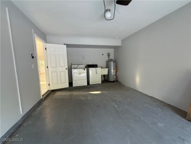 Pool home, duplex, on golf course. NO HOA. New roof in 2015. New on Lehigh Resort Club in Florida - for sale on GolfHomes.com, golf home, golf lot
