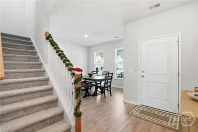 Discover elegant Low-Country living in the gated community of on Savannah Quarters Country Club in Georgia - for sale on GolfHomes.com, golf home, golf lot