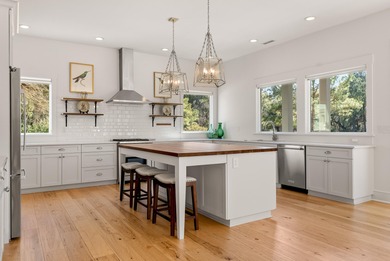 This stunning one-story home, built by Steve Koenig and designed on The Golf Club At Briars Creek in South Carolina - for sale on GolfHomes.com, golf home, golf lot