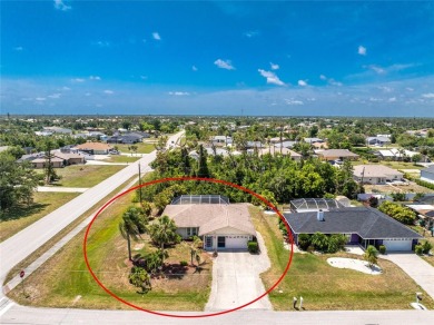 Move-In Ready Pool Home on a Corner Lot in Englewood - X Flood on Oyster Creek Golf Club in Florida - for sale on GolfHomes.com, golf home, golf lot