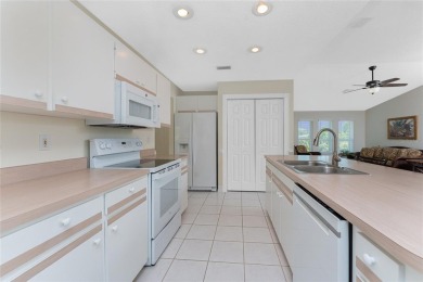 Move-In Ready Pool Home on a Corner Lot in Englewood - X Flood on Oyster Creek Golf Club in Florida - for sale on GolfHomes.com, golf home, golf lot