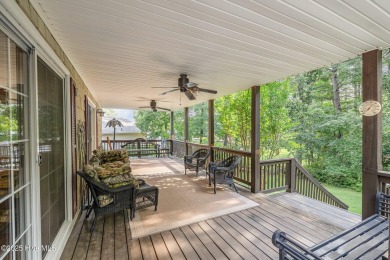 Experience lakeside living in this pristine 4 bed, 3 bath home on Seven Lakes Country Club in North Carolina - for sale on GolfHomes.com, golf home, golf lot
