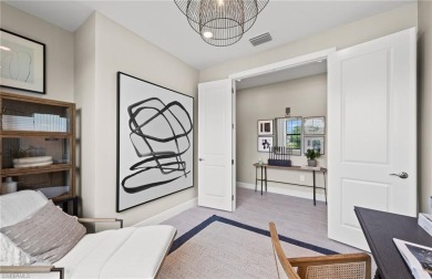 Enjoy low-maintenance, resort-style living in this beautifully on River Hall Country Club in Florida - for sale on GolfHomes.com, golf home, golf lot