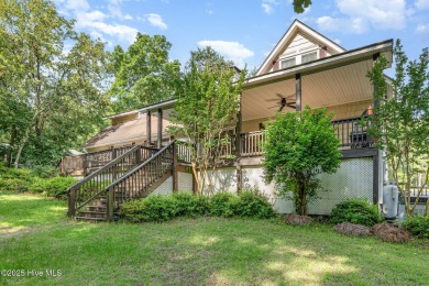 Experience lakeside living in this pristine 4 bed, 3 bath home on Seven Lakes Country Club in North Carolina - for sale on GolfHomes.com, golf home, golf lot