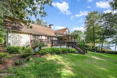 Experience lakeside living in this pristine 4 bed, 3 bath home on Seven Lakes Country Club in North Carolina - for sale on GolfHomes.com, golf home, golf lot